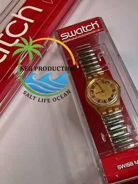 Swatch Gold and Silver Roman Numeral Watch
